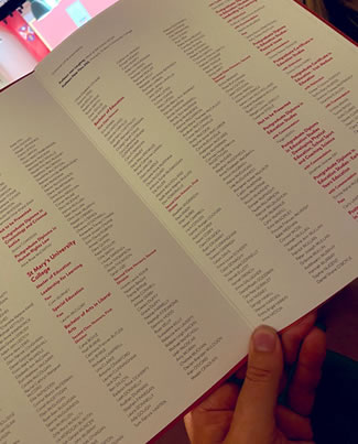 a photo of the graduation ceremony booklet with a close up of the St Mary's Univeristy College page and a list of the students that were to graduate.