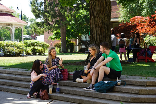 MEd students enjoying a break on University of Massachusetts campus.