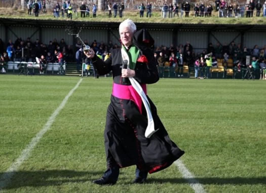 Bishop Noel Treanor blessing the new playing field at Davitt Park.