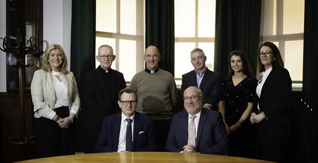 Principal of St Mary's University, Professor Peter Finn pictured with Vice-Chancellor of Queens University, Professor Ian Greer. Also pictured behind (L-R) Deirdre Cree (Student Services Coordinator), Rev Dr Paul Fleming (Head of Religious Education), Fr Feidhlimidh Magennis (Director of Liberal Arts), Brian McFall (Director of Finance and Administration), Bronagh McCaughan (Student Union President), Eilis McAteer (PA to the Principal)