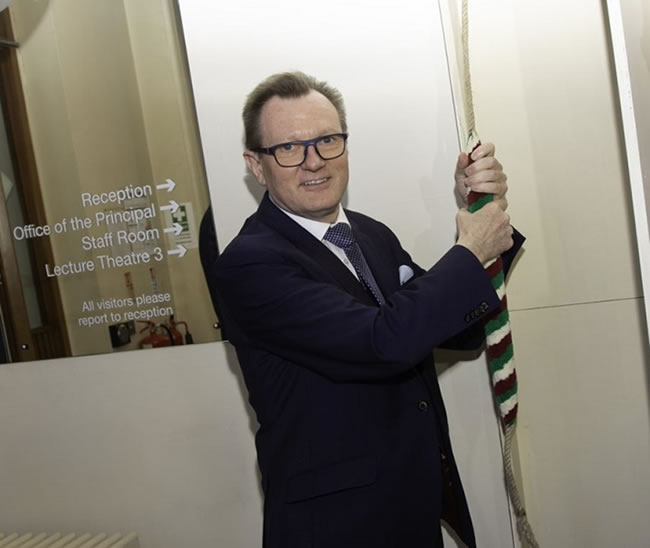 Vice-Chancellor of Queens University, Professor Ian Greer ringing the College bell which is a tradition at St Mary’s to inform the community that a VIP is on campus.