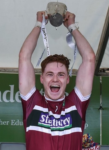 St Mary's team captain, Conor Meyler, raises the Sigerson Cup in victory 