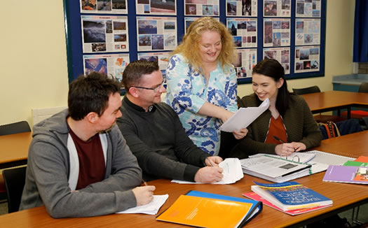 Lecturer Nora O Baoill with her students.