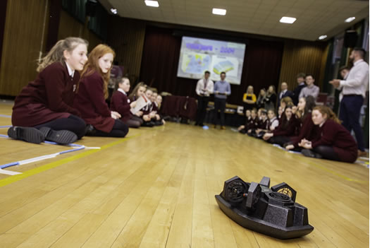 Some of the St Dominic's students using drones, robots and hovercrafts during the STEM event.