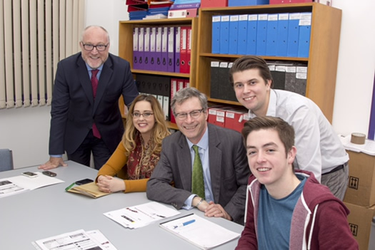 Students Natalie Kavanagh and Paul Devlin with the College Principal and officials from GuildHE